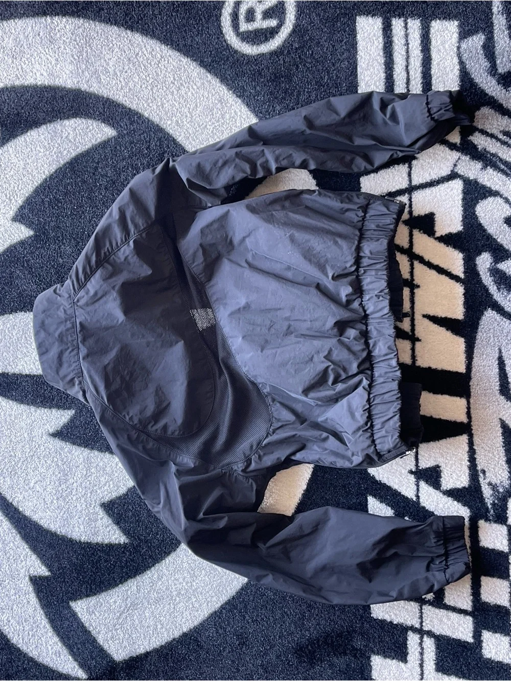 Nike Kids Black Lightweight Windbreaker Jacket with White Swoosh